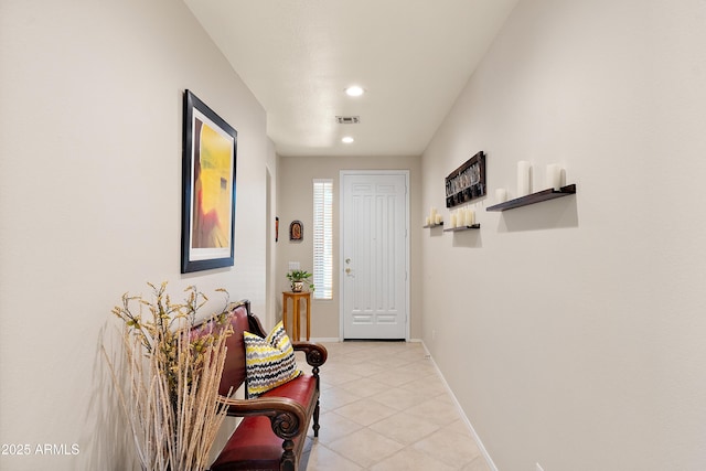 1819 W Deer Creek Rd, Phoenix, AZ 85045 - entryway with light tile patterned floors, recessed lighting, and baseboards