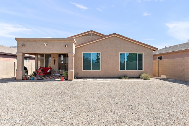1819 W Deer Creek Rd, Phoenix, AZ 85045 - view of front of property featuring a fenced backyard, stucco siding, and a patio
