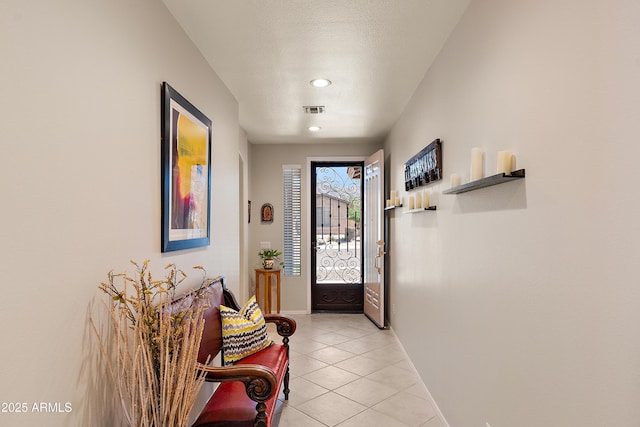 1819 W Deer Creek Rd, Phoenix, AZ 85045 - foyer featuring baseboards, light tile patterned floors, and recessed lighting