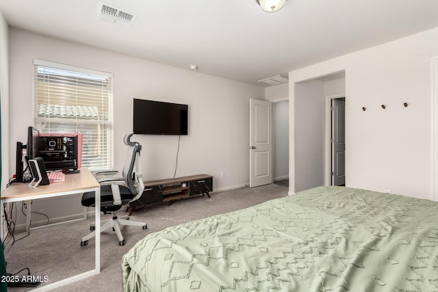 bedroom featuring visible vents and light colored carpet