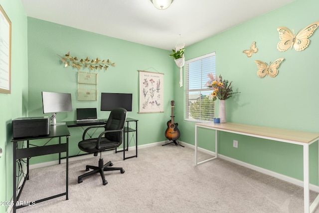 carpeted office with baseboards