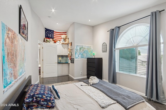 bedroom featuring dark hardwood / wood-style floors