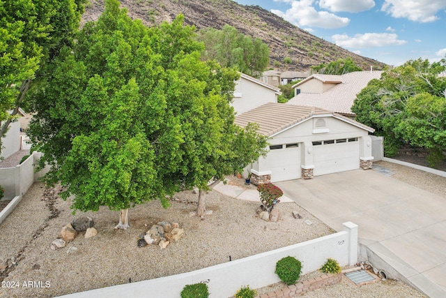 view of front facade featuring a mountain view