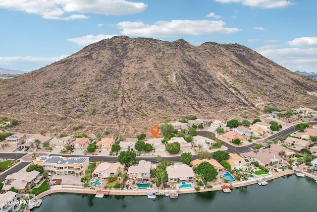 view of mountain feature with a water view