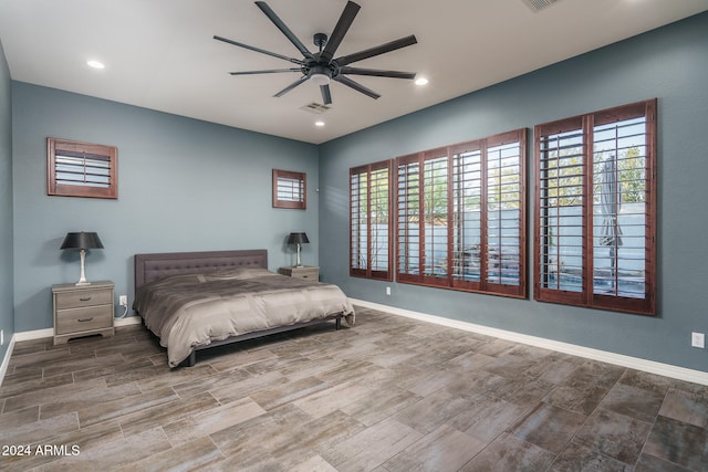 bedroom featuring ceiling fan and wood-type flooring