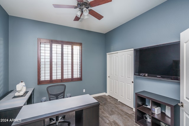 office with hardwood / wood-style floors and ceiling fan