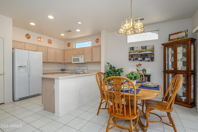 16354 W Labyrinth Ln, Surprise, AZ 85374 - dining space featuring plenty of natural light, a chandelier, recessed lighting, and light tile patterned floors