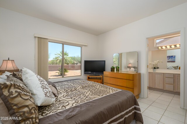 16354 W Labyrinth Ln, Surprise, AZ 85374 - bedroom featuring access to outside, light tile patterned flooring, and ensuite bathroom
