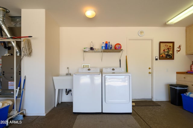 16354 W Labyrinth Ln, Surprise, AZ 85374 - laundry area with washing machine and clothes dryer and carpet floors