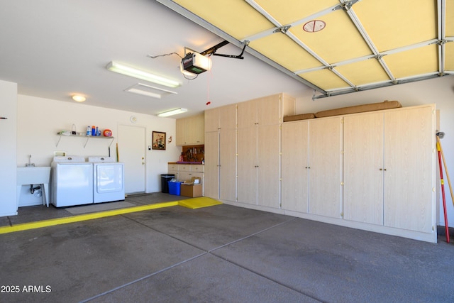 16354 W Labyrinth Ln, Surprise, AZ 85374 - garage with washer and clothes dryer and a garage door opener