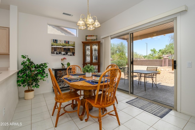 16354 W Labyrinth Ln, Surprise, AZ 85374 - dining space featuring a chandelier and light tile patterned flooring