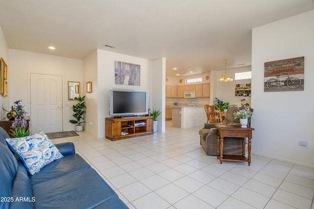 16354 W Labyrinth Ln, Surprise, AZ 85374 - living area with recessed lighting, light tile patterned floors, and a chandelier