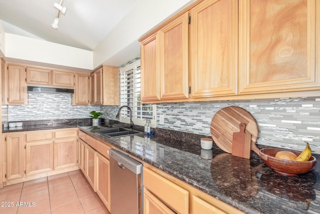 kitchen with sink, light tile patterned flooring, stainless steel dishwasher, and light brown cabinets