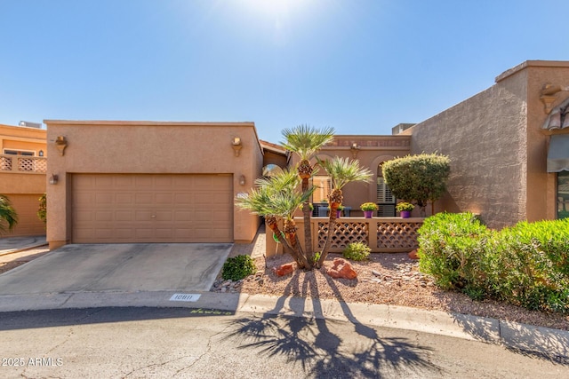 adobe home featuring a garage