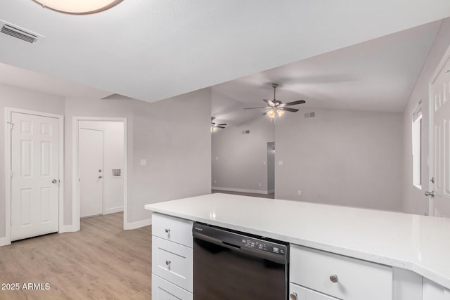 kitchen with dishwasher, white cabinetry, baseboards, light wood finished floors, and a ceiling fan