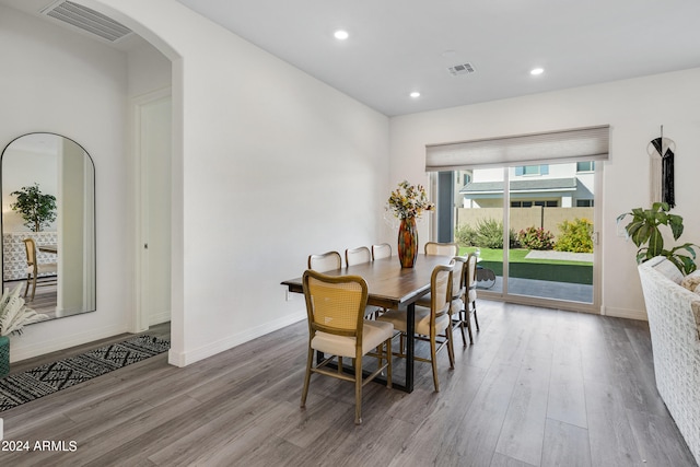 dining space featuring light hardwood / wood-style floors