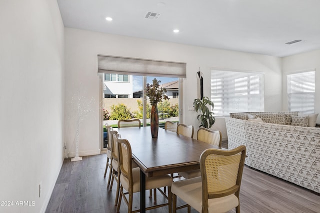 dining area featuring hardwood / wood-style floors