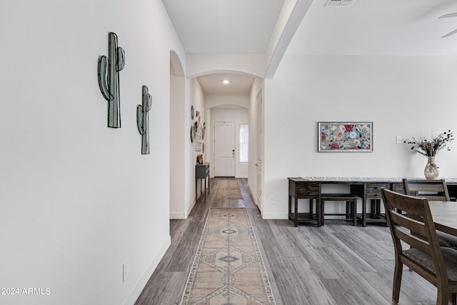 hall featuring wood-type flooring