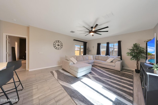 12731 W Myrtle Ave, Glendale, AZ 85307 - living area with ceiling fan and baseboards