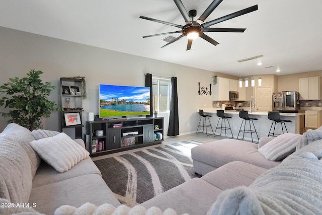 12731 W Myrtle Ave, Glendale, AZ 85307 - living area featuring ceiling fan and light wood finished floors