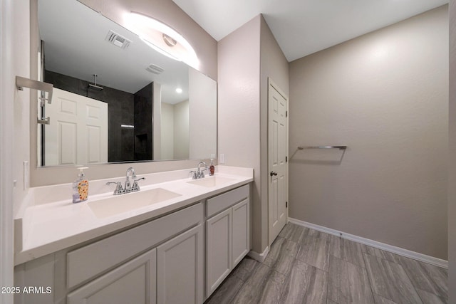12731 W Myrtle Ave, Glendale, AZ 85307 - full bath featuring double vanity, wood finished floors, and a shower