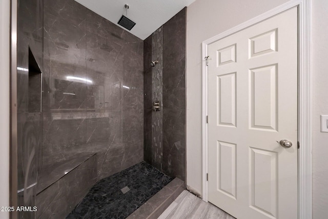 12731 W Myrtle Ave, Glendale, AZ 85307 - bathroom featuring a marble finish shower