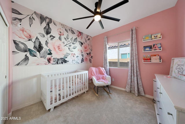 12731 W Myrtle Ave, Glendale, AZ 85307 - carpeted bedroom with a crib and a ceiling fan