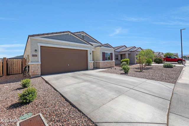12731 W Myrtle Ave, Glendale, AZ 85307 - ranch-style house featuring stone siding, an attached garage, concrete driveway, and stucco siding