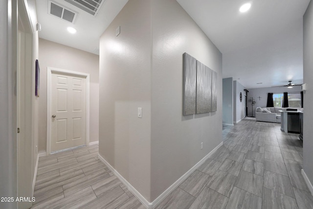 12731 W Myrtle Ave, Glendale, AZ 85307 - corridor featuring baseboards and wood finish floors