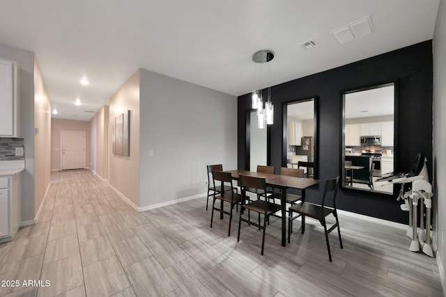 12731 W Myrtle Ave, Glendale, AZ 85307 - dining space with light wood-type flooring and recessed lighting