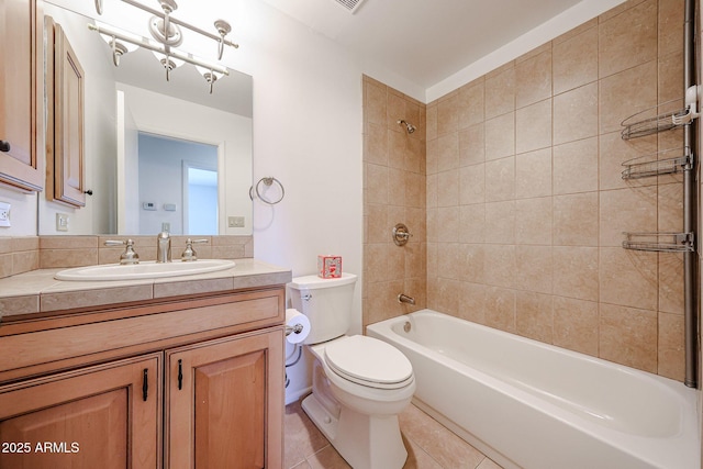 bathroom featuring toilet, tile patterned flooring, shower / bath combination, and vanity