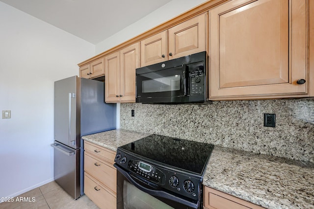 kitchen with black appliances, light tile patterned floors, light brown cabinetry, and backsplash