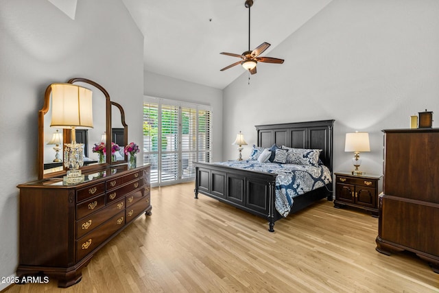 10429 N 101st St, Scottsdale, AZ 85258 - bedroom with access to exterior, light wood-type flooring, high vaulted ceiling, and ceiling fan