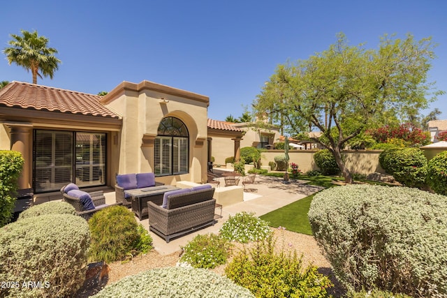 10429 N 101st St, Scottsdale, AZ 85258 - back of house with an outdoor hangout area, a patio, a tile roof, and stucco siding