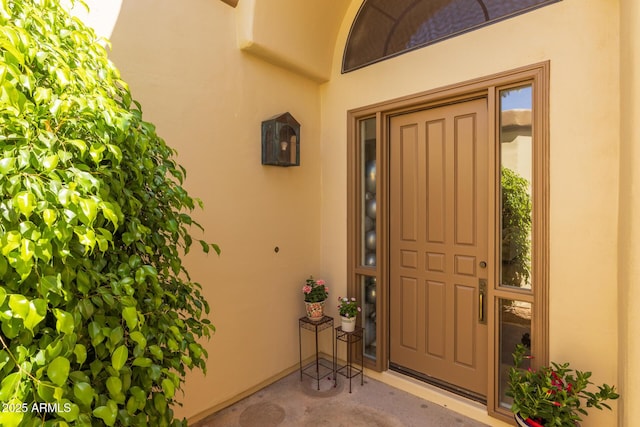 10429 N 101st St, Scottsdale, AZ 85258 - doorway to property with stucco siding