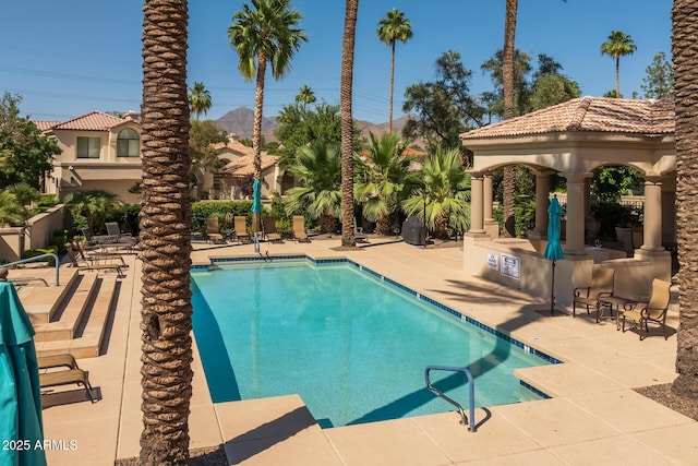 10429 N 101st St, Scottsdale, AZ 85258 - community pool featuring a patio, a gazebo, and a mountain view
