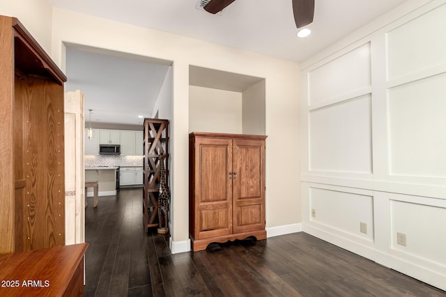 5754 N Aztec Dr, Eloy, AZ 85131 - interior space featuring recessed lighting, dark wood-style flooring, and baseboards