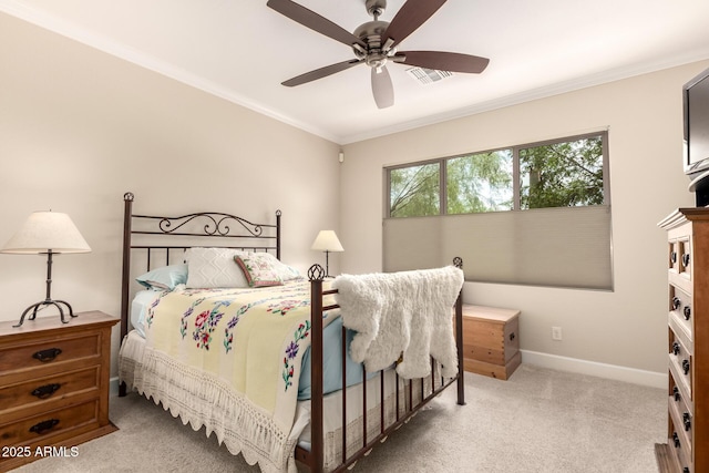 5754 N Aztec Dr, Eloy, AZ 85131 - carpeted bedroom featuring crown molding, baseboards, and a ceiling fan