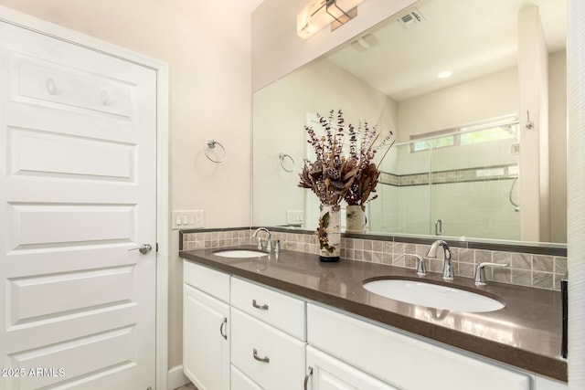 5754 N Aztec Dr, Eloy, AZ 85131 - bathroom featuring double vanity and a stall shower