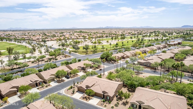 5754 N Aztec Dr, Eloy, AZ 85131 - aerial perspective of suburban area featuring mountains and a local golf course