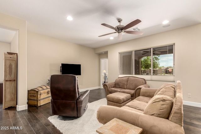 5754 N Aztec Dr, Eloy, AZ 85131 - living area with dark wood finished floors, a ceiling fan, baseboards, and recessed lighting