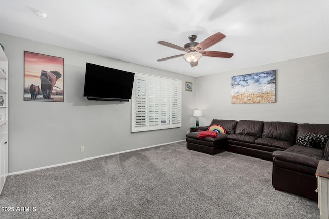 carpeted living room with baseboards and ceiling fan