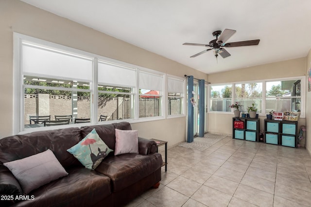 living room with tile patterned floors and ceiling fan