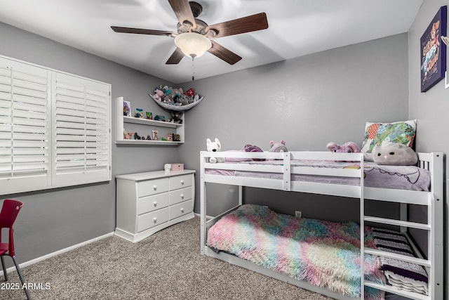 bedroom featuring carpet flooring, a ceiling fan, and baseboards