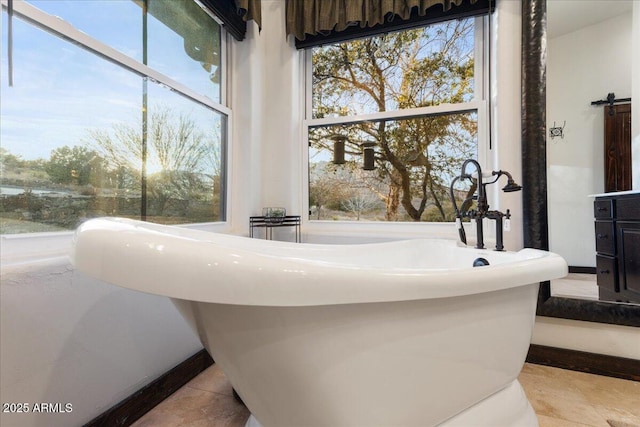 bathroom featuring a tub to relax in