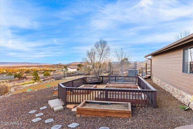 view of yard with a wooden deck