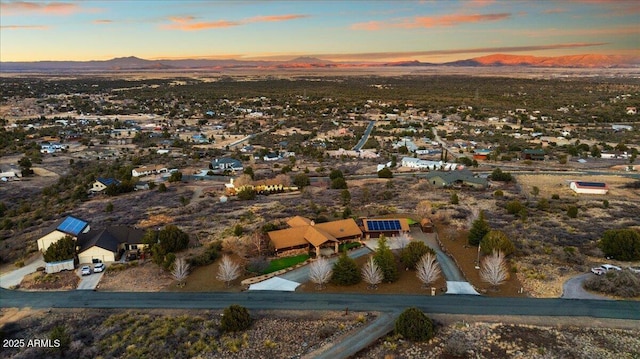 aerial view at dusk with a mountain view