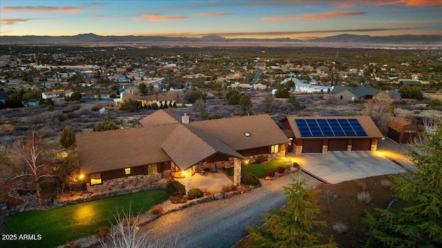 aerial view at dusk with a mountain view