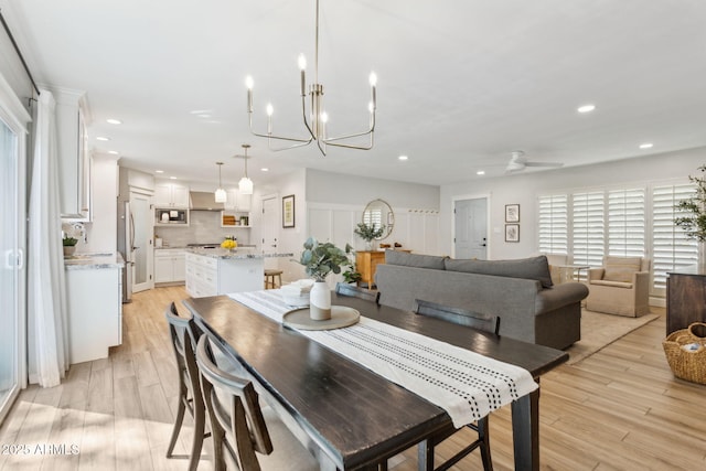 dining area featuring recessed lighting, light wood-style floors, and ceiling fan