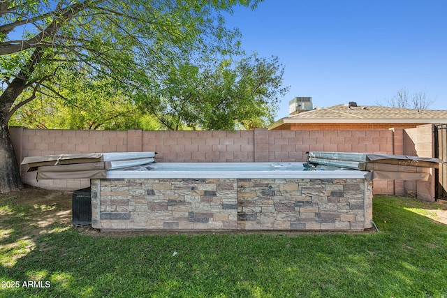 view of patio with central air condition unit, area for grilling, and fence